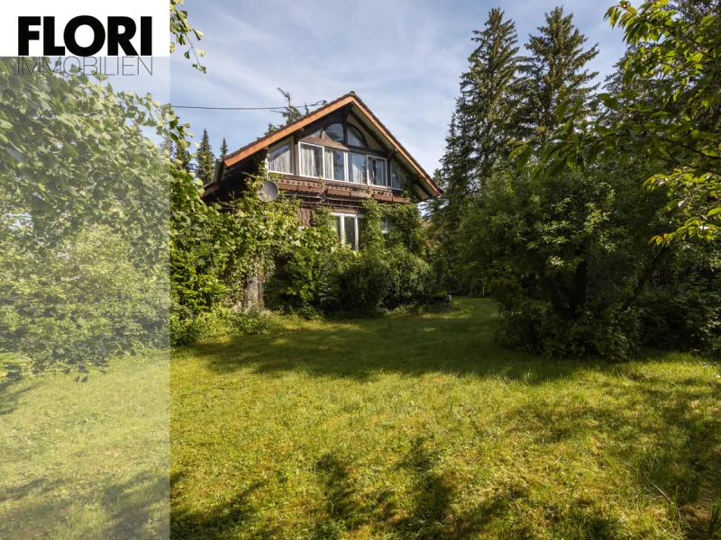 Flori Immobilien - Haus kaufen in Gröbenzell - Verwunschenes Gartenstadthaus sucht Liebhaber zum sanieren oder neu bauen!