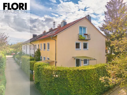 Flori Immobilien - Haus kaufen in Oberhaching - Guten vermietetes Reiheneckhaus in ruhiger Lage