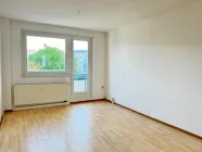 Wohnzimmer mit Balkon