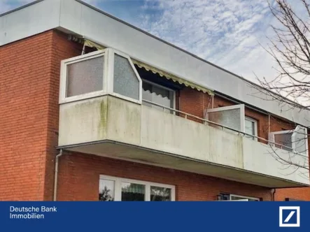 Herzlich Willkommen - Wohnung kaufen in Husum - Gut vermietete 2 Zimmer Wohnung mit Balkon, guter Einbauküche, modernisierten Bad und Stellplatz