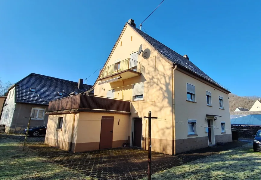 Titel - Haus kaufen in Idar-Oberstein - Ihr neues Zuhause in Idar-Oberstein – Geräumiges Einfamilienhaus in ruhiger Lage