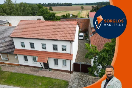 Titelbild.jpg - Haus kaufen in Magdeburg  - Idyllisch gelegenes Einfamilienhaus im Grünen - Viel Platz für die ganze Familie