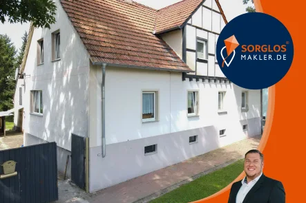 Titelbild - Haus kaufen in Wanzleben - Reizvolle Doppelhaushälfte in Schleibnitz 