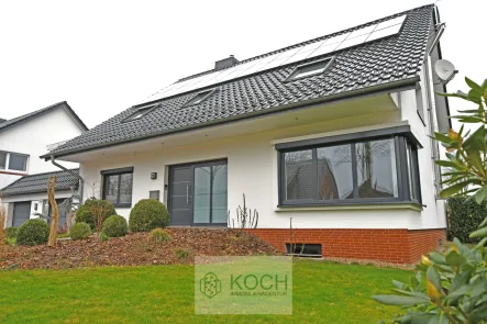 Seitenansicht - Haus kaufen in Loxstedt / Stinstedt - Modernes und energetisch gutes Ein-/ Zweifamilienhaus