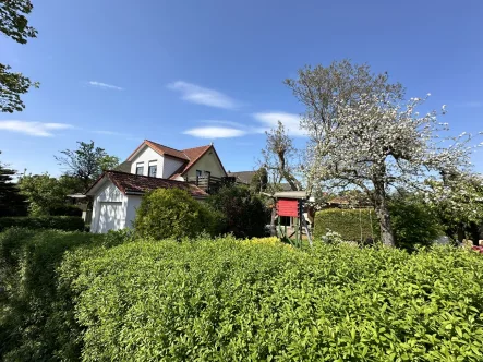 Gartenansicht - Haus kaufen in Geestland / Langen - Ein-/ Zweifamilienhaus in ruhiger und dennoch zentraler Lage von Langen