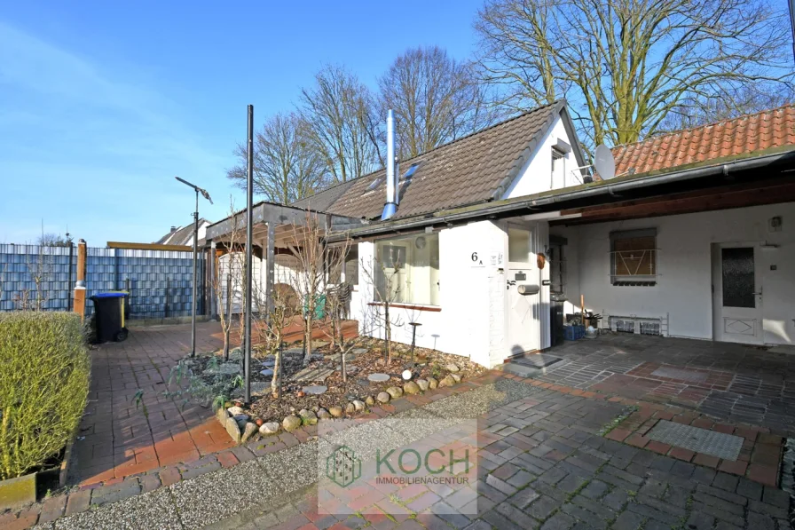 Seitenansicht - Haus kaufen in Bremerhaven / Leherheide - Doppelhaushälfte mit Garten anstatt einer Eigentumswohnung