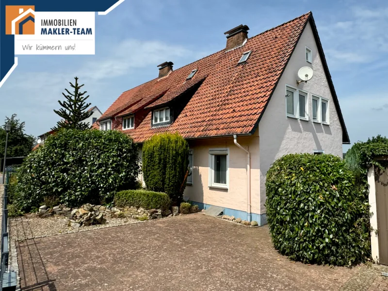 Königsbergerst_Titelbild - Haus kaufen in Bad Essen - Doppelhaushälfte mit Fernsicht in beliebter Lage von Bad Essen