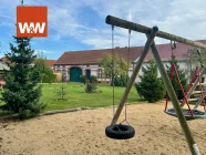 Blick auf das Haus vom nahegelegenem Spielplatz 