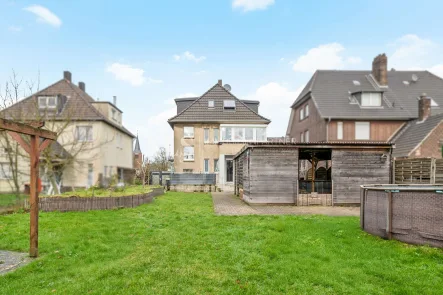 Gartenansicht - Haus kaufen in Dorsten - Platz für alle: Großzügiges Haus mit Garten – flexibel als Einfamilien- oder Mehrgenerationenhaus