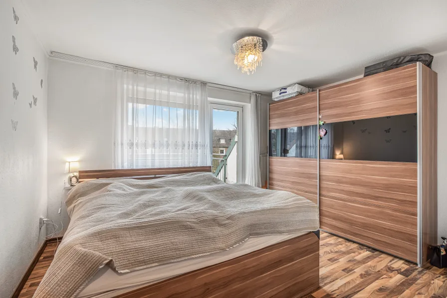 Das Schlafzimmer mit Balkon