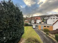 Aussicht vom Balkon auf Garten