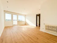 Ansicht Wohnzimmer zum Balkon