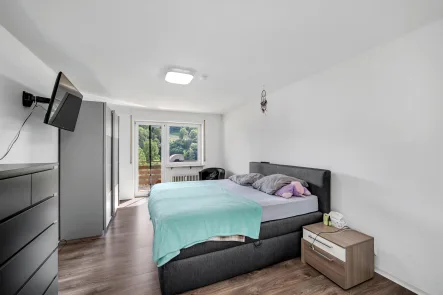 Schlafzimmer - Wohnung kaufen in Mulfingen - Praktische 2-Zimmer EG-Wohnung mit Traumblick