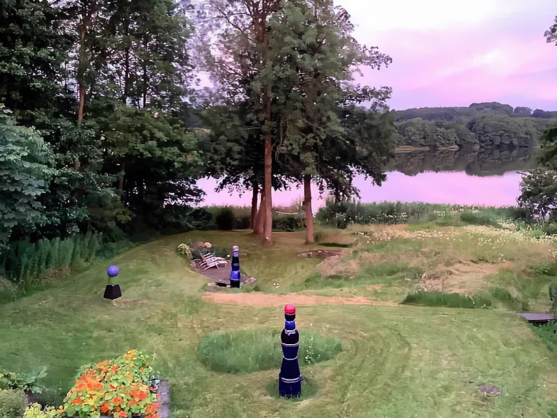 Garten - Haus kaufen in Niehuus - Exklusive Immobilie in idyllischer Lage am Niehuuser See