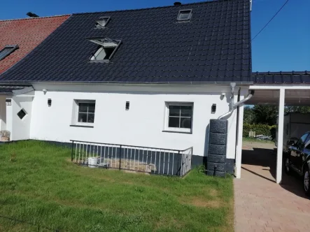 Haus Ansicht frontal - Haus kaufen in Bütow / Karchow - Voll entspannt hier:DHH und Nebengelass nahe Karchower Seemit 211 m² Wfl.