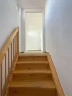 Treppe zur Einliegerwohnung/Büro